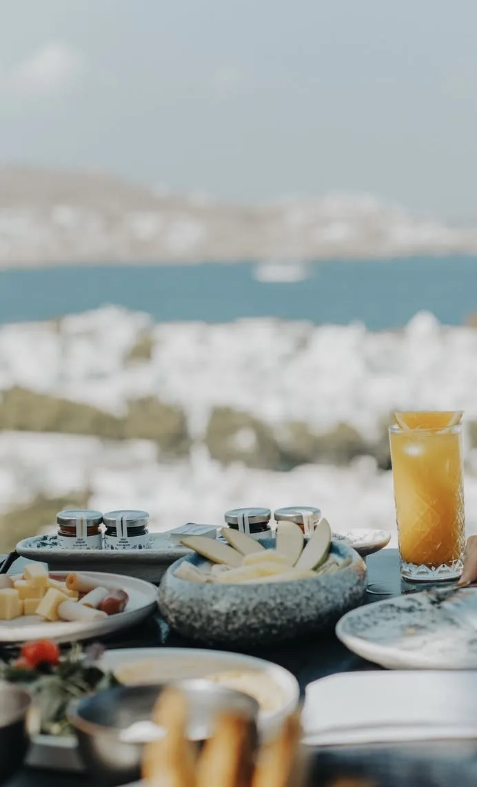 Mediterranean hotel breakfast with SeaCrets preserves and a sea view